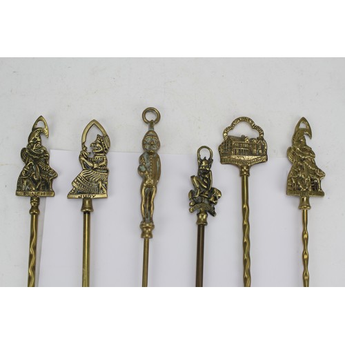 680 - A Collection of Brass Toasting Forks.