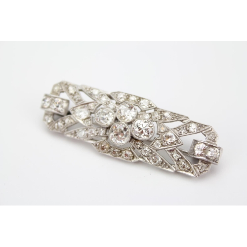 66 - A Beautiful 1930's Diamond and Platinum Set Brooch Set with Four Diamonds in a Collar Setting with F... 