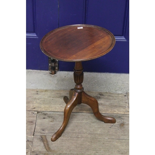 222 - A small Mahogany Wine Table Resting on Pedestal Base. Measuring: 44cms high x 30cms diameter.