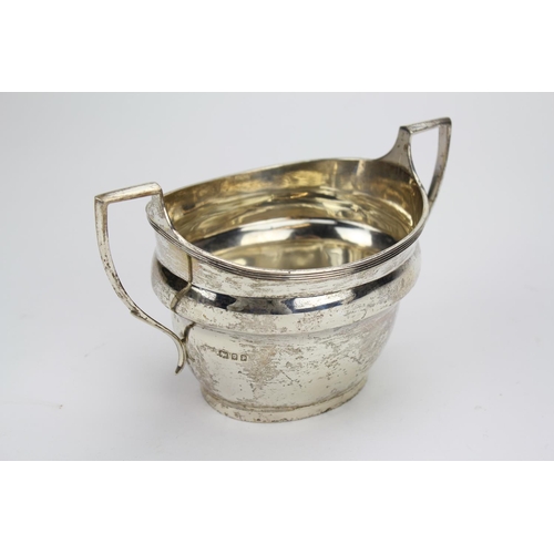 9 - A Mappin and Webb Georgian Design Two Handled Silver Sugar Bowl London P. Weighing 217 Grams.