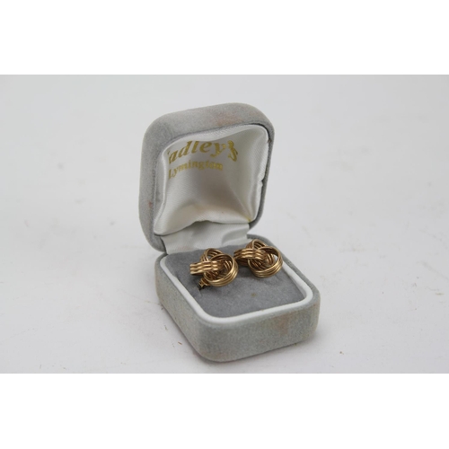 99 - A Pair of 9ct Gold Rope swirl pattern pierced earrings in original box. Weight: 2.4g