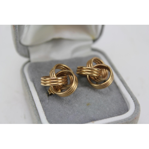 99 - A Pair of 9ct Gold Rope swirl pattern pierced earrings in original box. Weight: 2.4g