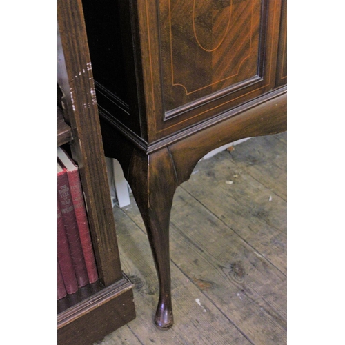 211 - A late 19th century Satinwood inlaid mahogany display cabinet with fitted shelves, single door resti... 