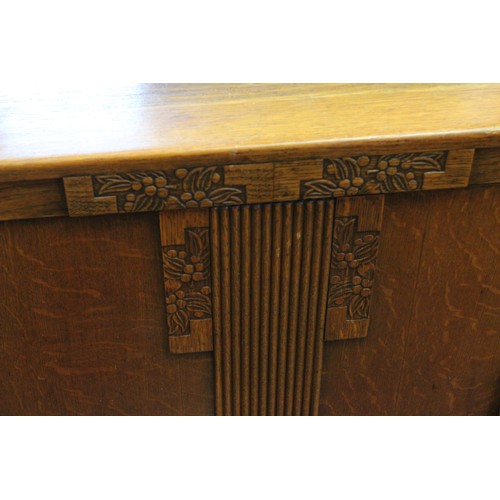 443 - A 1920's Oak Bureau with 3 fitted graduated drawers. Along with a Dinning Room Cabinet. Measuring: 9... 