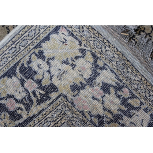 298 - A pale blue ground rug decorated with birds. Measuring: 50 inches Wide x 72 inches Long.