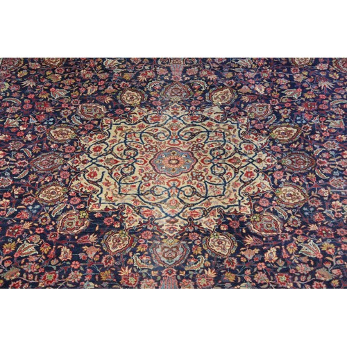 299 - A Large All Over Floral Gul Bordered Cream, Rust & Blue Corner decorated Persian Rug. Measuring: 297... 