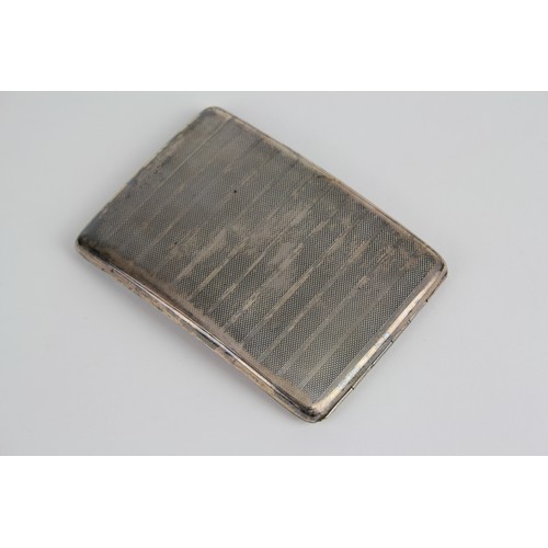 84 - A Silver engraved Cigarette Case. Weighing: 130g.