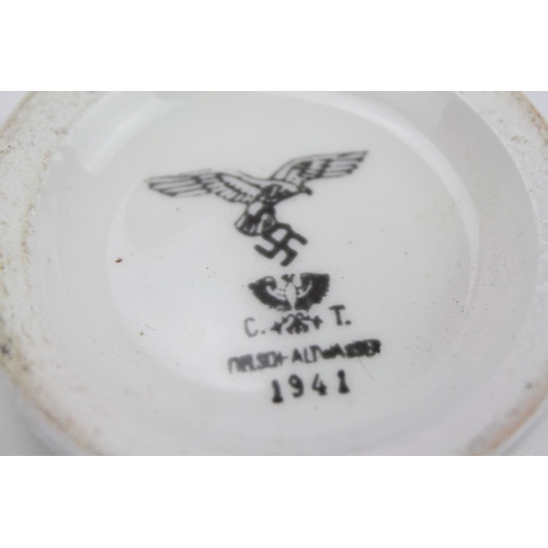 261 - Four items of Nazi insignia China to include a Sauce Boat, Two Plates, (Makers CT 1941) and one othe... 