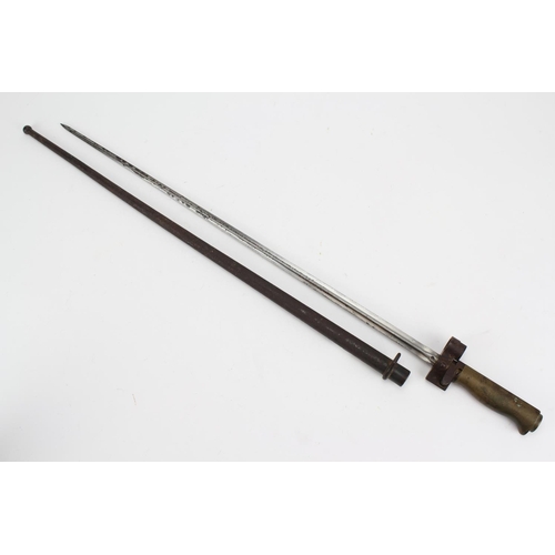 267 - A French brass handled Napoleonic era bayonet of square construction outer mounted metal scabbard.