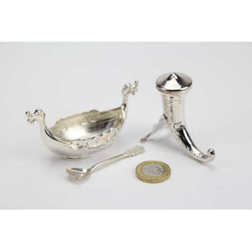 92 - A Norwegian Silver Viking Boat Salt Cellar along with a Silver Pepperette.