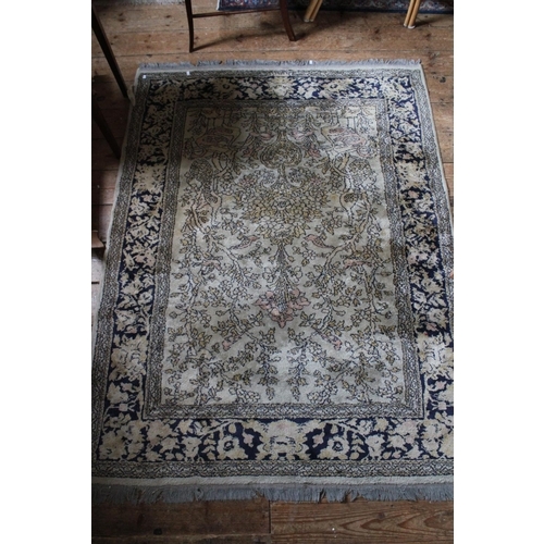 298 - A pale blue ground rug decorated with birds. Measuring: 50 inches Wide x 72 inches Long.