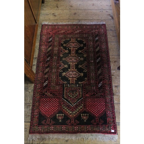 297 - A small Red patterned rug.