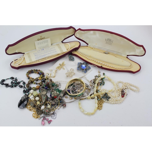 100 - A Box containing 2 x Lotus Necklaces in Original boxes along with Ethnic Jewellery.