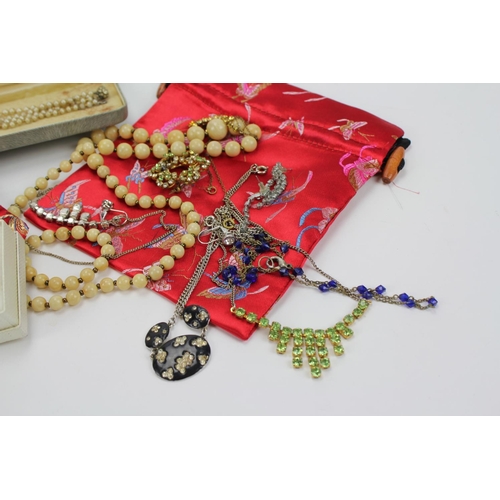 19 - A Chinese hard stone necklace, a box of pearls, beads, etc.