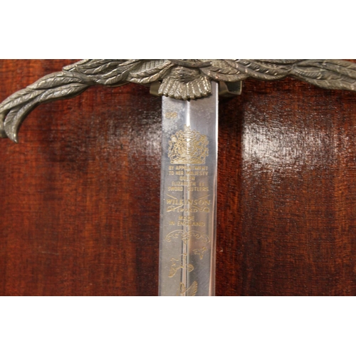 50 - A Limited Edition Wilkinson sword with leather grip, twin eagle mounts inscribed 1945-1995, 50 years... 