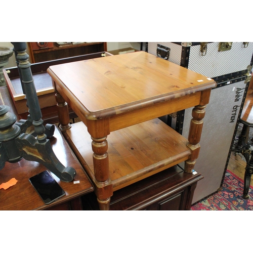 71 - A Square Topped Pine Coffee Table resting on turned legs.