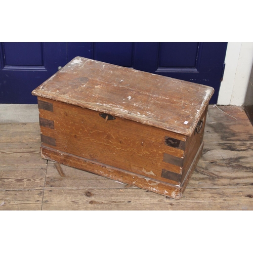 68 - A Wooden Trunk with Metal Handles & Metal Trim. Measuring: 69cms long x 40cmd deep x 35cms high.