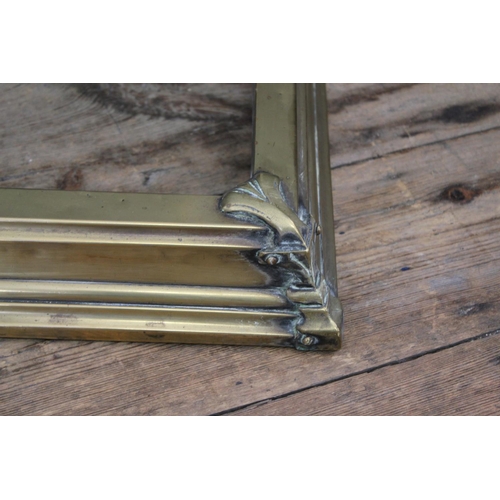 654 - A Sheet Brass Kerb with Cast Brass Corners. Measuring: 123cms long x 36cms deep. (Inside: 122cms lon... 