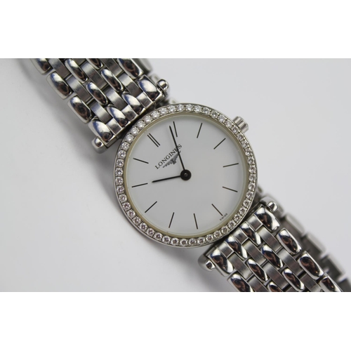 169 - A Ladies beautiful Stainless Steel Longines Cocktail watch with a Diamond Studded Bezel & White Face... 