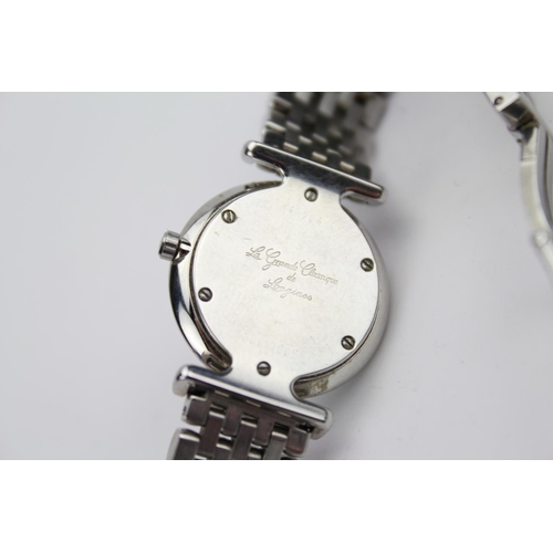 169 - A Ladies beautiful Stainless Steel Longines Cocktail watch with a Diamond Studded Bezel & White Face... 