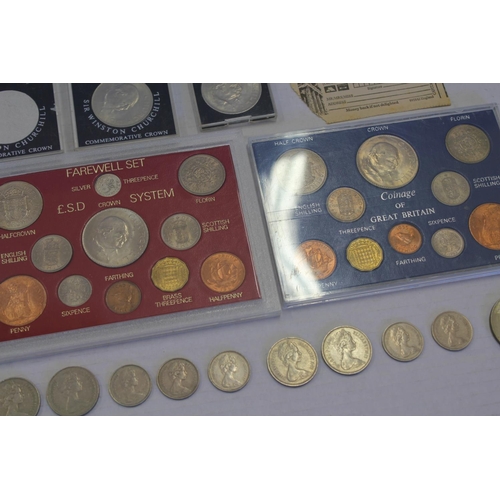 207 - A Collection of 1960s Cupro-Nickel Coins to include: Commemorative 5 Shillings plus loose 2 Shilling... 