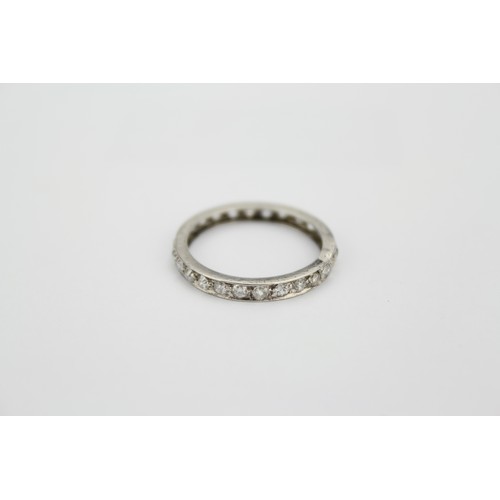 83 - A Stunning Full 26 stone Diamond set Eternity Ring set in Platinum. Ring Size: UK O. Weight: 2g