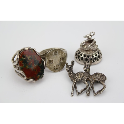 144 - 2 x Antique Silver Rings, Silver Dear Brooch & a Silver Swan Seal.