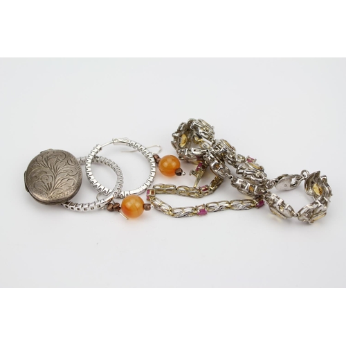 148 - A small collection of jewellery, to include a Silver locket, two Silver bracelets and two pairs of e... 