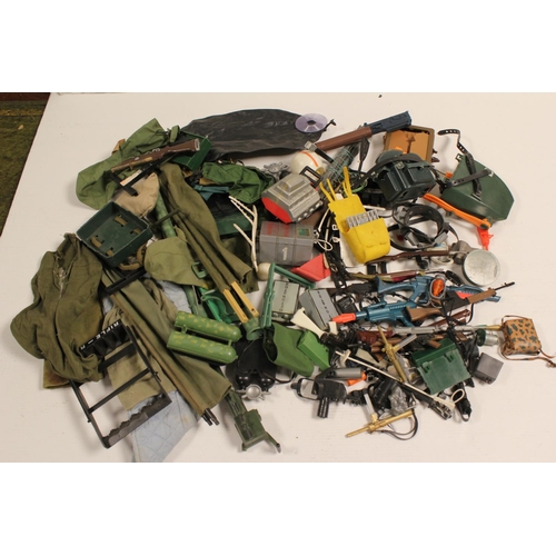 205 - A Collection of Original Action Man accessories to include: Guns, Binoculars, Back Packs, Walkie Tal... 