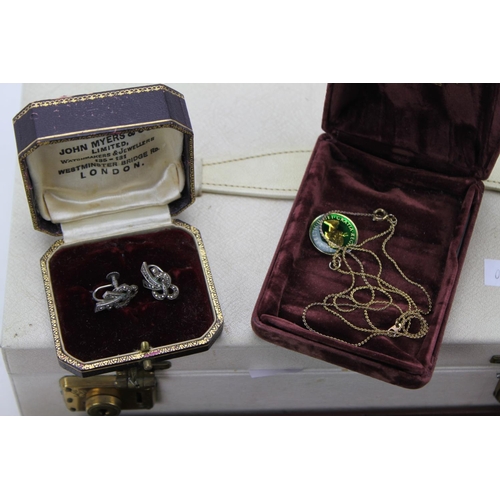 56 - An Antique Jewellery Box containing of Silver Marcasite earrings, butterfly brooch, Coin pendant, et... 