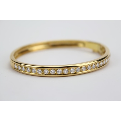 58 - A Beautiful 18ct Gold Diamond Set Bangle. Total Diamonds: 27 Brilliant Cut. Previous Valuation by Mi... 