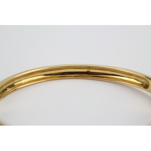 58 - A Beautiful 18ct Gold Diamond Set Bangle. Total Diamonds: 27 Brilliant Cut. Previous Valuation by Mi... 