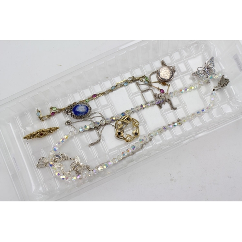 70 - A Collection of Jewellery to include a lustre necklace, locket, Silver Chains, Brooches, etc.