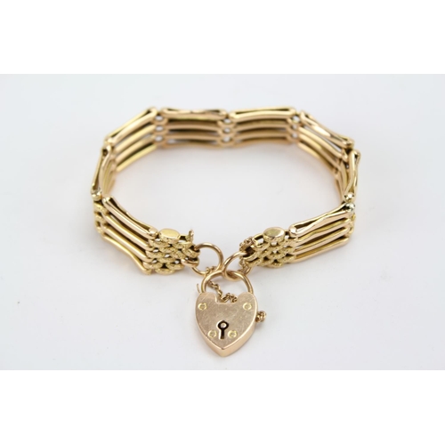 71 - An Antique 15ct Gold 4 bar gate bracelet with heart shaped locket. Weighing: 16 grams.