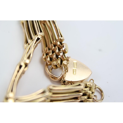 71 - An Antique 15ct Gold 4 bar gate bracelet with heart shaped locket. Weighing: 16 grams.