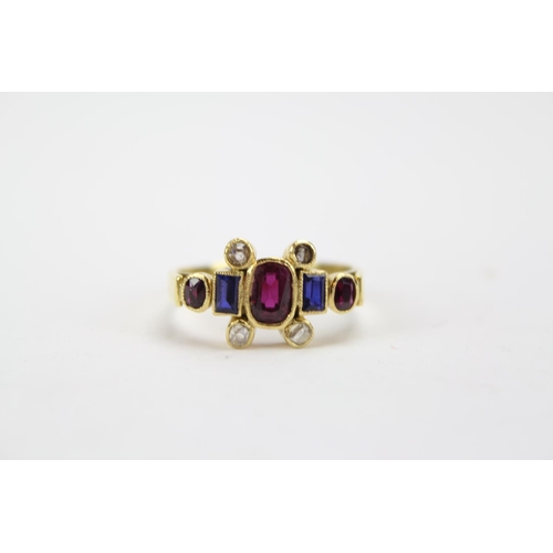 76 - An 18ct Gold Ring set with garnets & diamonds, Ruby coloured stones. Weighing: 4.8 grams.