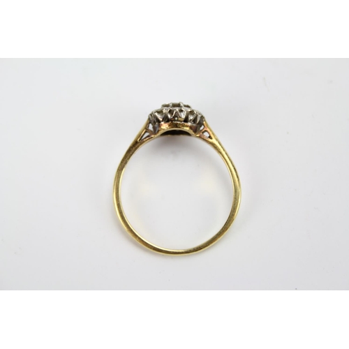 77 - A Ladies Gold and Diamond Dress Ring set with 9 stones.