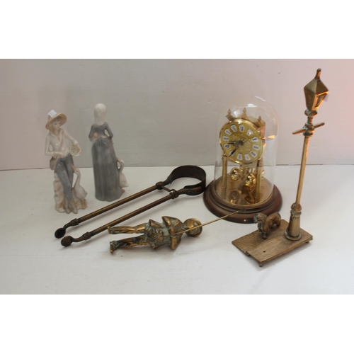 543 - A Brass Study of a Fisherman, a Set of Tongs, an Anniversary Clock & 2 Figurines.