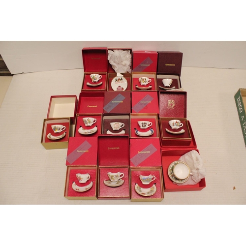 450 - A collection of Caverswall Bone China Miniature Cups and Saucers, etc. All Boxed.