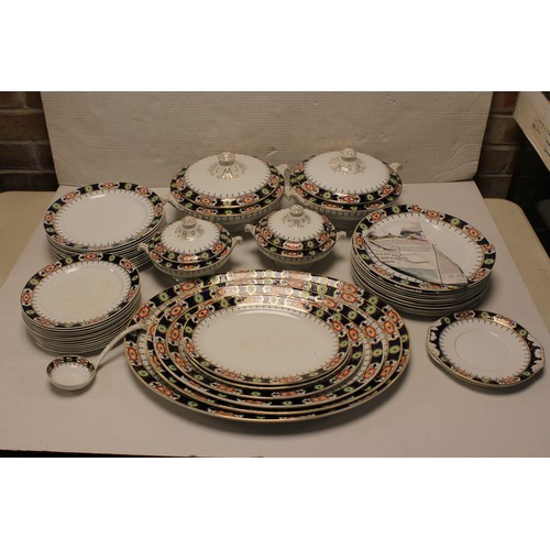 456 - A Rust & Blue Dinner Service to include Serving Plates, Dinner Plates, 4 x Tureens. (40+).