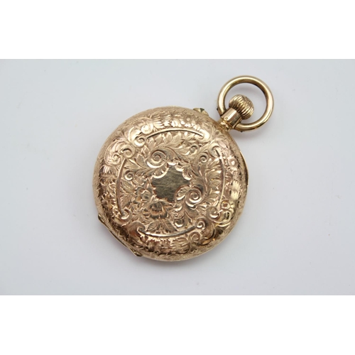 126 - A Ladies Swiss 14K marked pocket watch with engraved chapter ring.