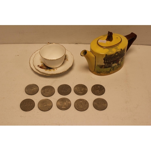 467 - A Royal Worcester Cabinet Cup and Saucer, a Royal Doulton Tea Pot & a collection of Coins.