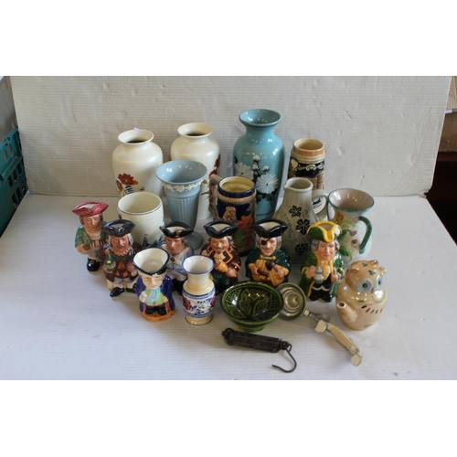 474 - A Collection of China Ware to include Poole Pottery, Floral vases, a collection of Toby jugs and oth... 