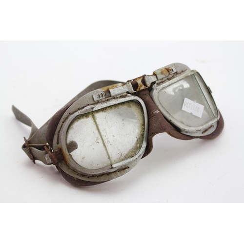 219 - A Pair of Early Leather and Glass Motor Goggles. AF.