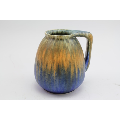 488 - A Ruskin of West Smethwick orange and blue jug, marked Ruskin 1925?. 13cm