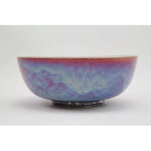 492 - A Ruskin of West Smethwick Sang de Boeuf bowl, marked Ruskin 1925. Measuring: 22cm.