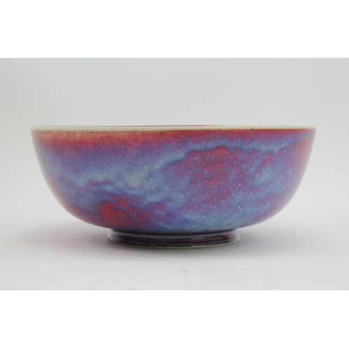 492 - A Ruskin of West Smethwick Sang de Boeuf bowl, marked Ruskin 1925. Measuring: 22cm.