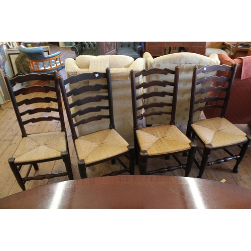 372 - A set of 4 Lancashire Splat and Rush seated chairs on turned legs.