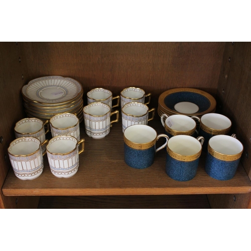 499 - A Set of 8 Swedish Gilt Floral edge coffee cans and a set of 5 Wedgwood powder blue glazed coffee ca... 