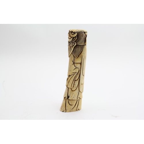 153 - An Antique Carved Bone Study of a Confucius Sage. Measuring: 20 cms high.